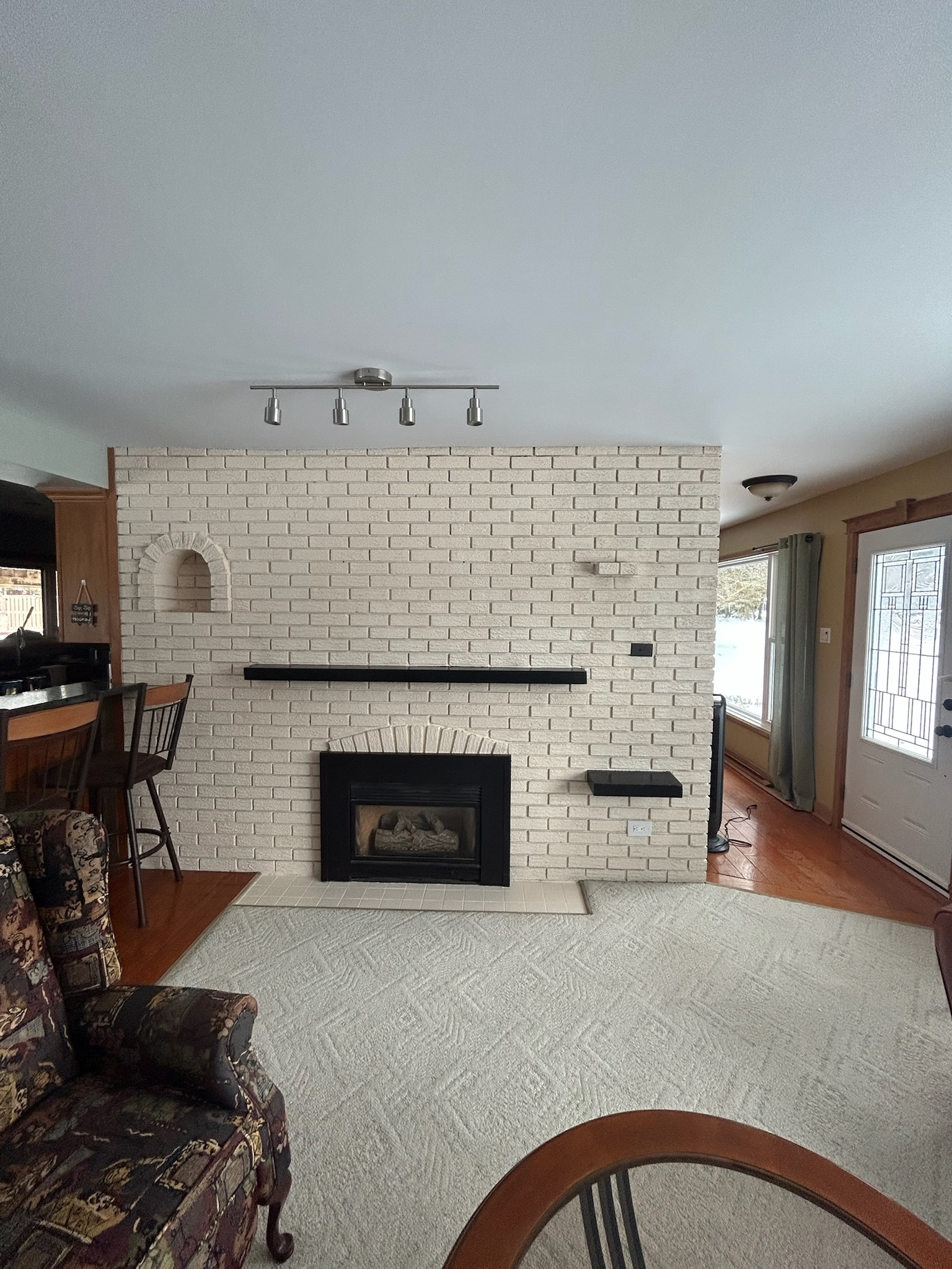 a painted brick fireplace