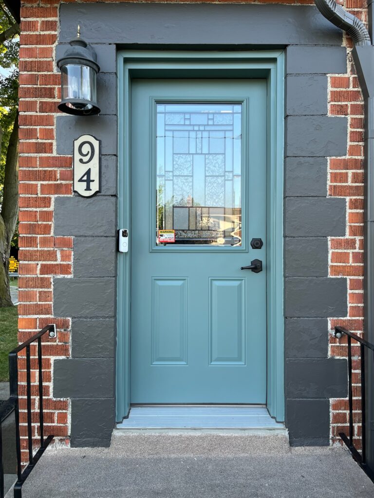 blue door with brown squares around it
